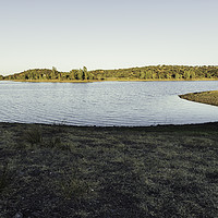 Buy canvas prints of Sunny lake with eucalyptus mountain in the backgro by Juan Ramón Ramos Rivero