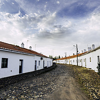 Buy canvas prints of Stoned street with white facades and chimneys by Juan Ramón Ramos Rivero