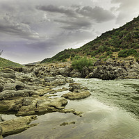 Buy canvas prints of  Guadiana river going down between the rocks and m by Juan Ramón Ramos Rivero