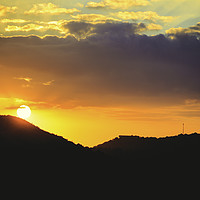 Buy canvas prints of Panorama of sunset orange sky with sun by Juan Ramón Ramos Rivero