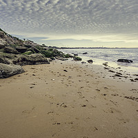 Buy canvas prints of Small wet sand beach surrounded by steep rocks cli by Juan Ramón Ramos Rivero