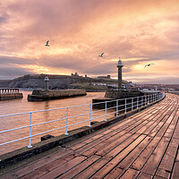 Buy canvas prints of Whitby Pier Sunrise by David Semmens