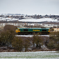 Buy canvas prints of Freight Train making the slow climb up the Welland Valley. by James Aston