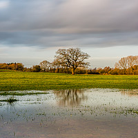 Buy canvas prints of Heavy Skies on a Winters afternoon by James Aston