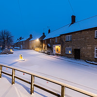Buy canvas prints of A Winters Snow Storm in Brigstock Northamptonshire by James Aston