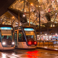 Buy canvas prints of Barcelona trams at night by Andrew Michael