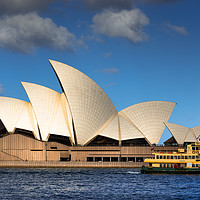 Buy canvas prints of Ferry goes past the Sydney Opera House  by Andrew Michael
