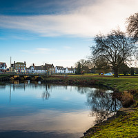 Buy canvas prints of Scenic views over the still waters of the Causeway by Andrew Michael