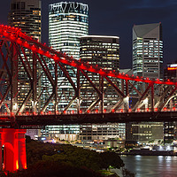 Buy canvas prints of Story Bridge lit after dark, Brisbane. by Andrew Michael