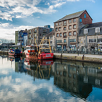 Buy canvas prints of Fishing boats moored at Sutton harbour by Andrew Michael