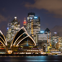 Buy canvas prints of Sydney Opera House and skyline after dark.  by Andrew Michael