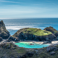 Buy canvas prints of Lone photographer on the rocks at Kynance Cove by Andrew Michael