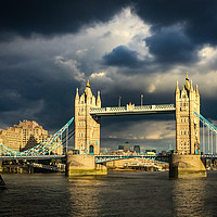 Buy canvas prints of Tower bridge illuminated in a dark sky by Claire Turner