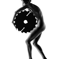 Buy canvas prints of Nude woman with saw blade 1 by Johan Swanepoel