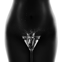 Buy canvas prints of Nude woman with martini splash by Johan Swanepoel