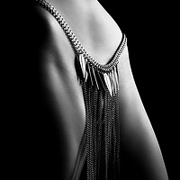 Buy canvas prints of Woman close-up chain panty by Johan Swanepoel