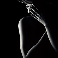 Buy canvas prints of Nude woman with black hat 3 by Johan Swanepoel