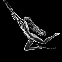 Buy canvas prints of Nude woman swinging on chains by Johan Swanepoel