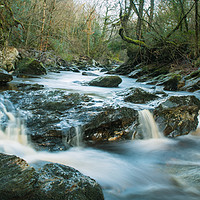 Buy canvas prints of Burntollet flows over rocks  by Ciaran Craig