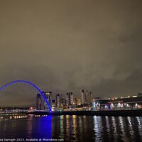 Buy canvas prints of Blue light Millenium Bridge at night, Gateshead  by Ailsa Darragh