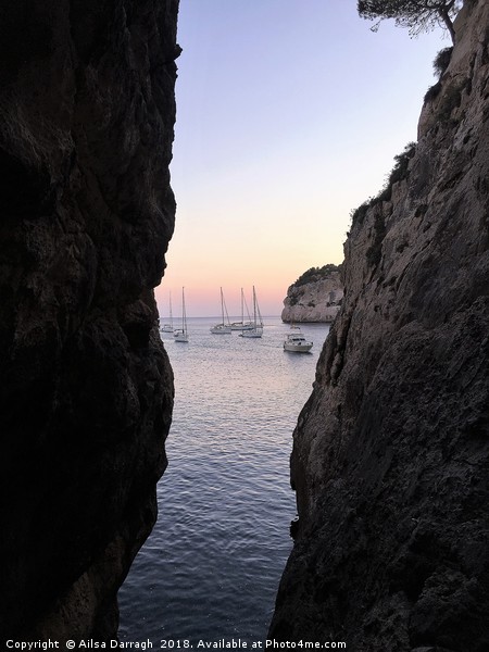 Boats at Sunset, Cala Galdana, Menorca Picture Board by Ailsa Darragh