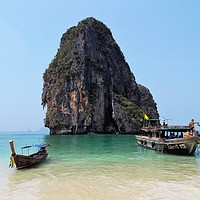 Buy canvas prints of Long Tail Boats on Krabi beach, Thailand by Ailsa Darragh