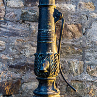 Buy canvas prints of Victorian Cast-Iron Water Pump in Blackness Village by Douglas Milne