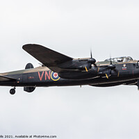 Buy canvas prints of Lancaster flypast by Clive Wells