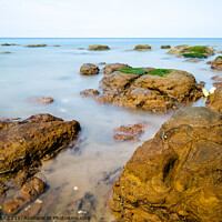 Buy canvas prints of Rocks in the sea by Clive Wells