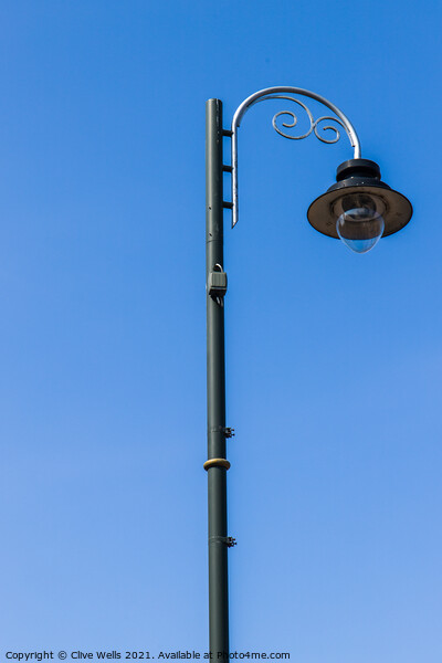 Single street lamp Picture Board by Clive Wells
