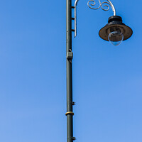 Buy canvas prints of Single street lamp by Clive Wells