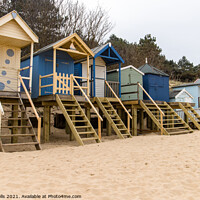 Buy canvas prints of Beach huts above the sand by Clive Wells