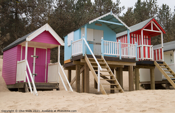 Pretty beach huts Picture Board by Clive Wells