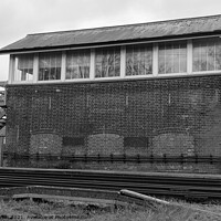 Buy canvas prints of Monochrome old signal box by Clive Wells