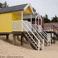 Buy canvas prints of Row of beach huts by Clive Wells