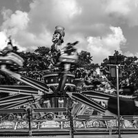 Buy canvas prints of Monochrome fairground ride by Clive Wells