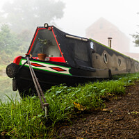 Buy canvas prints of Moored narrow boat in the mist. by Clive Wells