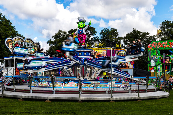 Speedy fairground ride in the WALKS, Kings Lynn. Picture Board by Clive Wells