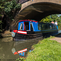 Buy canvas prints of Narrowboat under Candle Bridge by Clive Wells