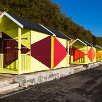 Buy canvas prints of Bright beach huts on Folkestone sea front by Clive Wells