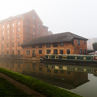 Buy canvas prints of Mist over the old warehouse by Clive Wells