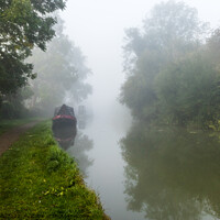 Buy canvas prints of Early morning fog on the canal by Clive Wells