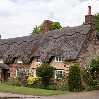 Buy canvas prints of Thatched cottage in Blisworth. by Clive Wells