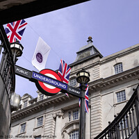 Buy canvas prints of Bunting above the tube station by Clive Wells