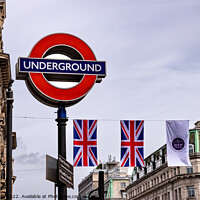 Buy canvas prints of Underground sign with bunting by Clive Wells