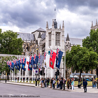 Buy canvas prints of Flags in front of West Minister Cathedral. by Clive Wells