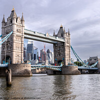 Buy canvas prints of Tower Bridge seen at high tide by Clive Wells