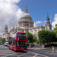Buy canvas prints of Red bus at St.Paul`s. by Clive Wells