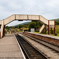 Buy canvas prints of Footbridge over the tracks by Clive Wells