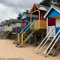 Buy canvas prints of Colourful beach huts by Clive Wells